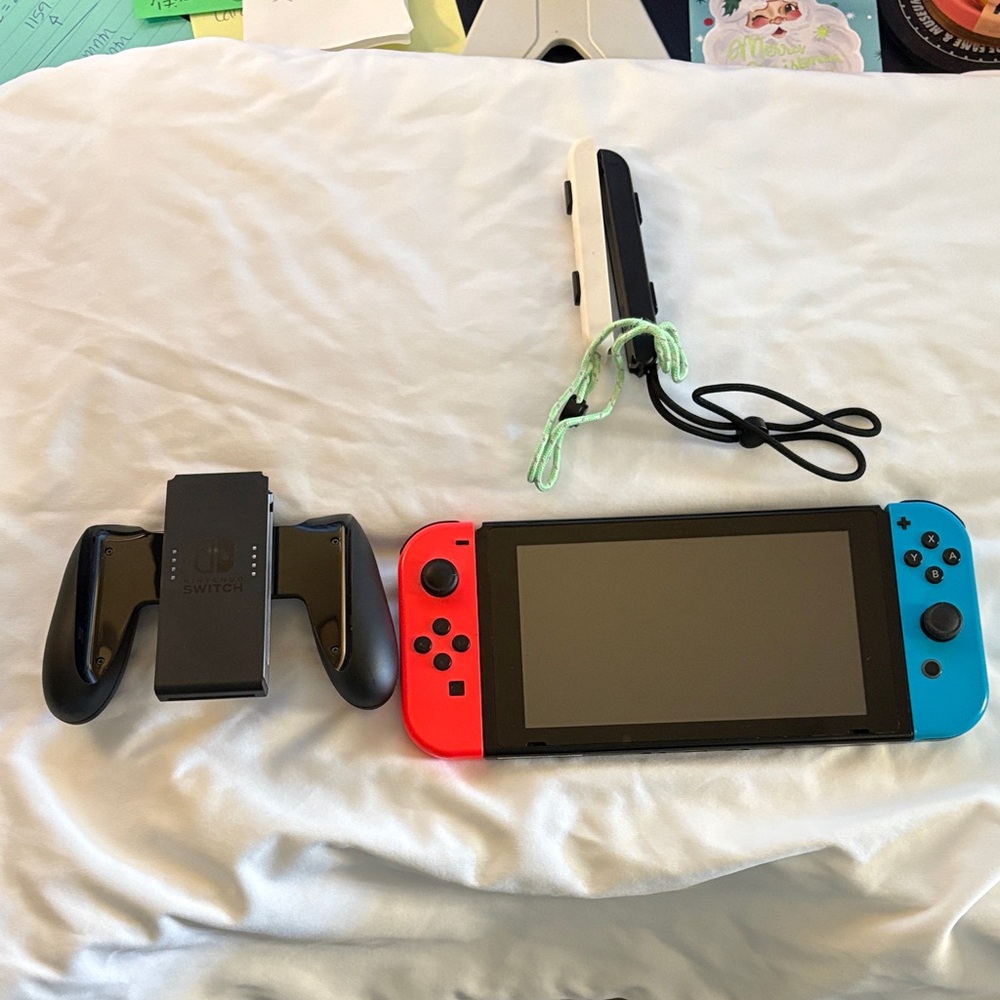 Nintendo Switch with Red and Blue Joy-Con Controllers